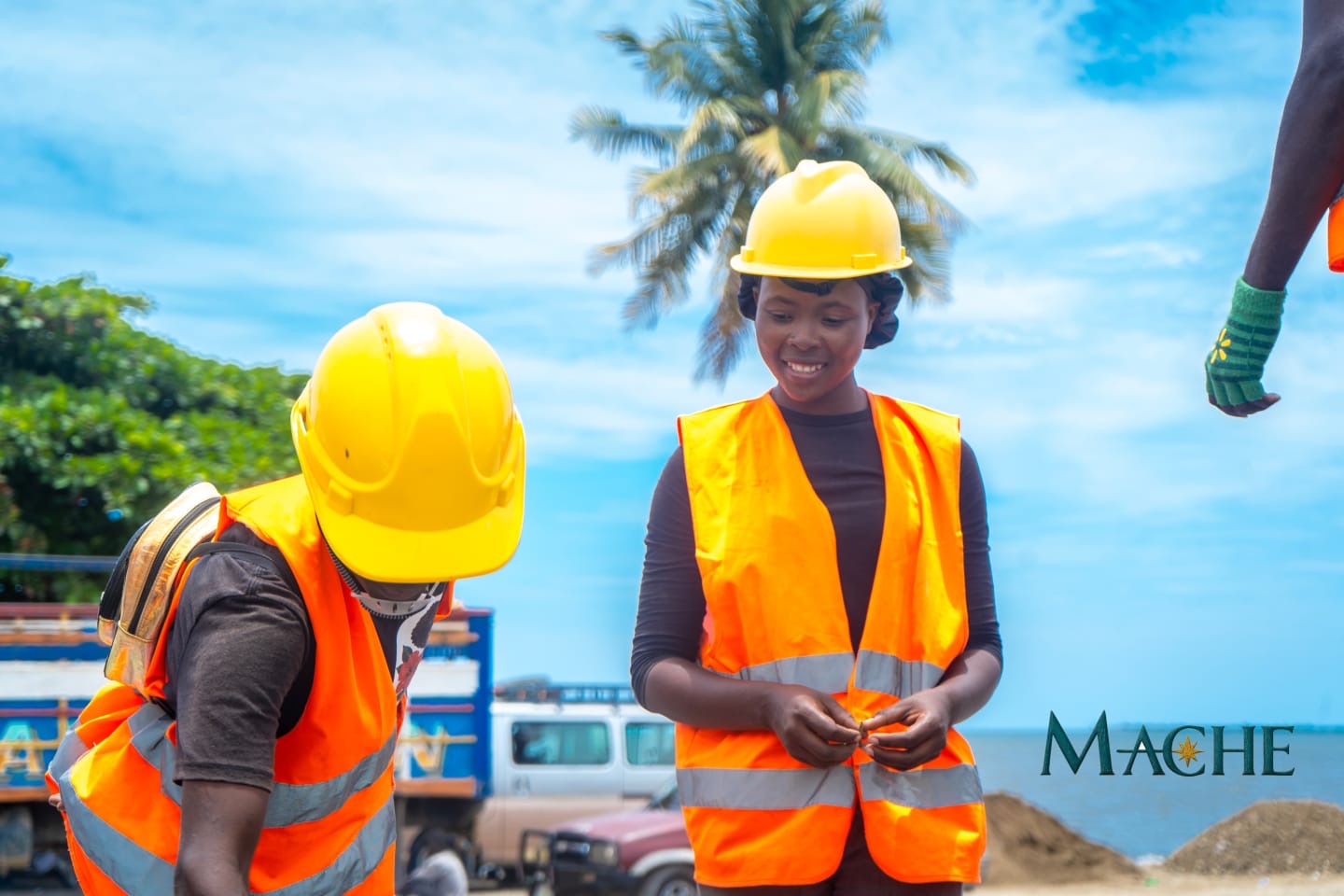 A MACHE crew member on the seafront — dignity, pride, the everyday face of the work.